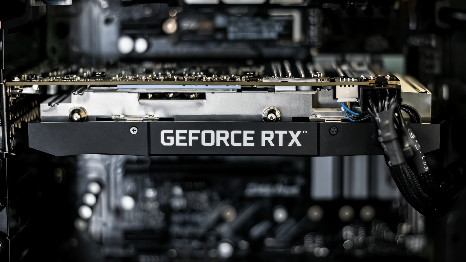 selective focus photography of GEFORCE RTX graphics card