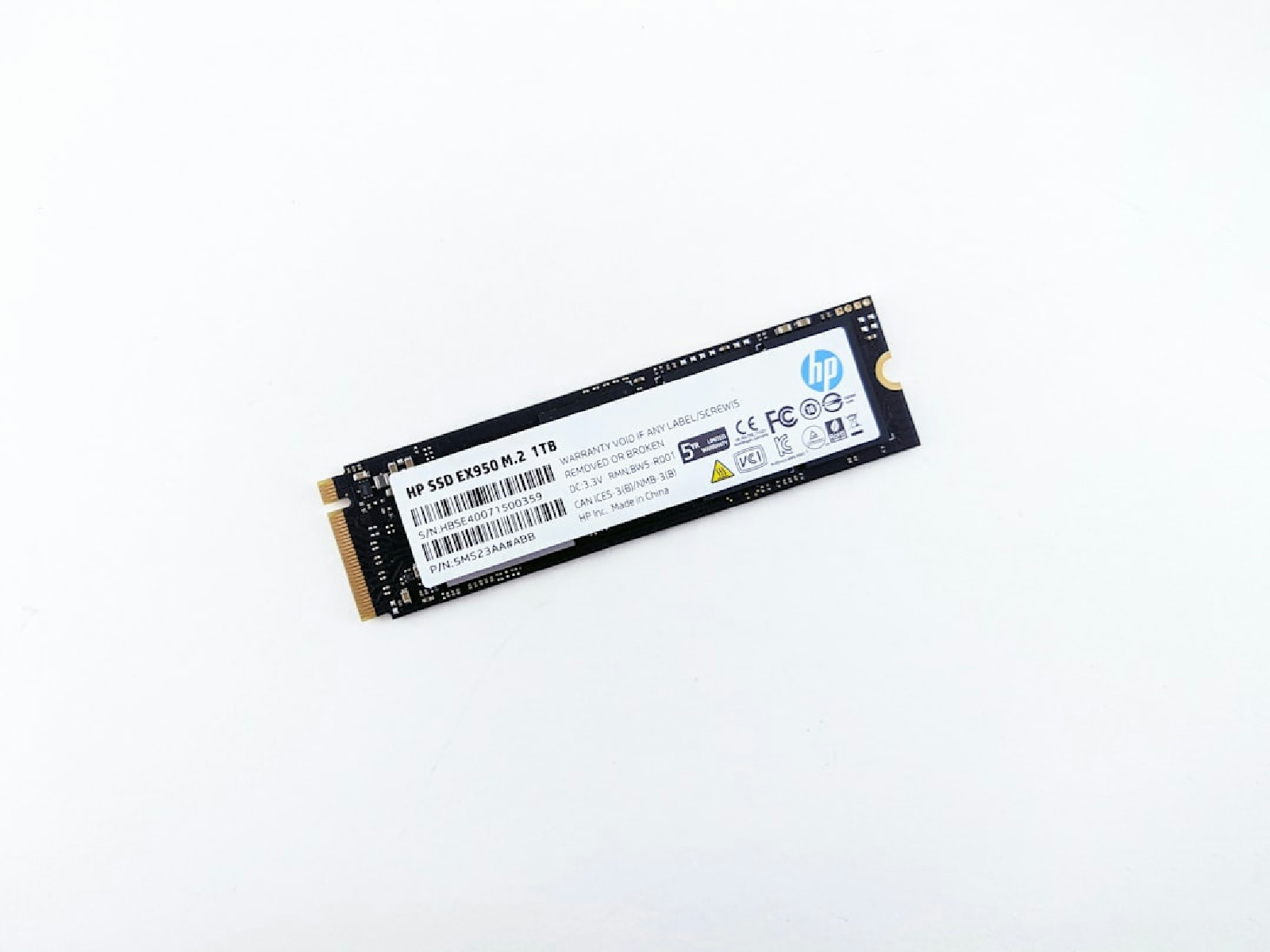 A close up of a memory card on a white surface